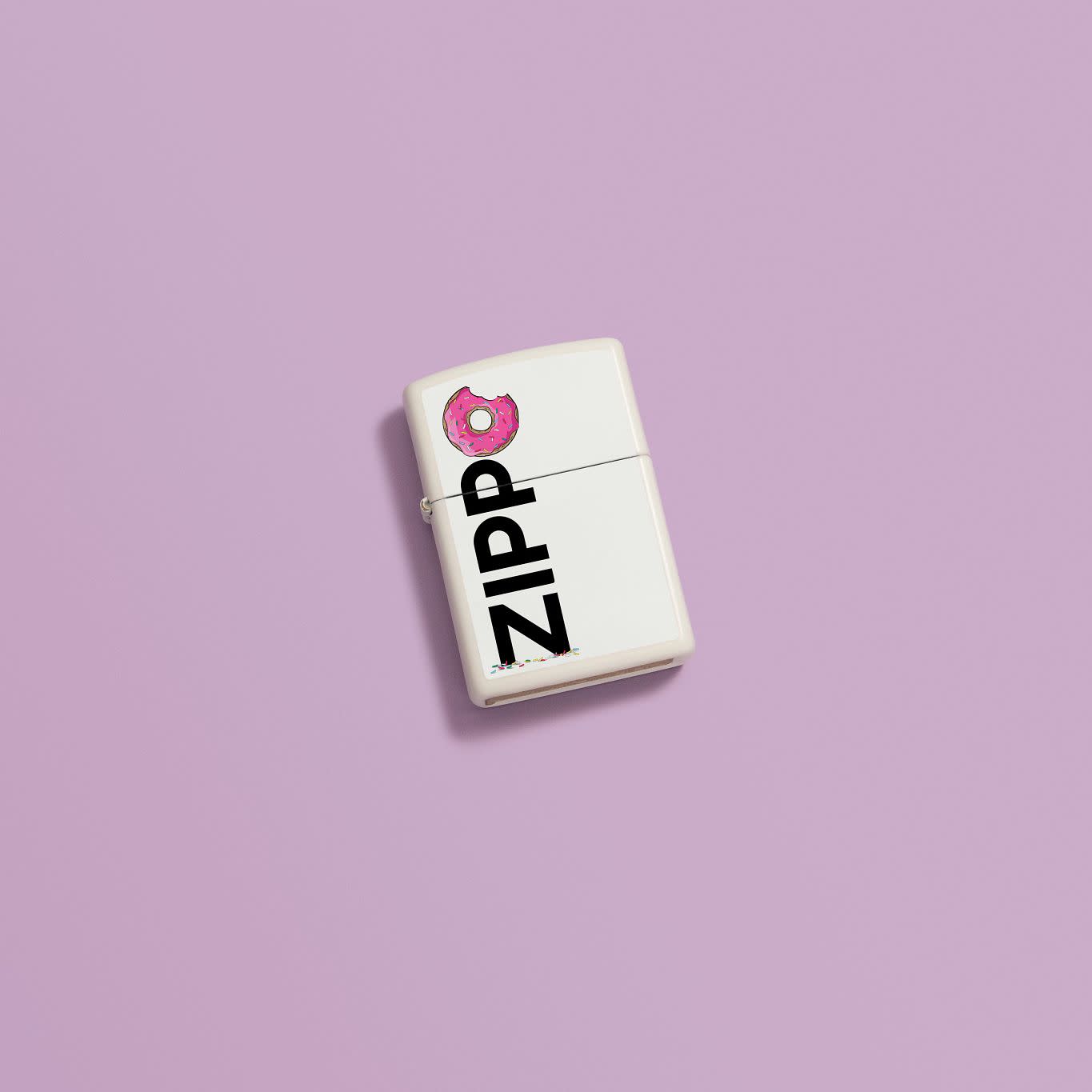 Lifestyle image of Frosted Zippo Design White Matte Windproof Lighter in a purple scene.
